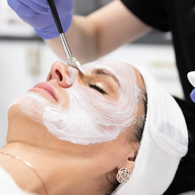 Woman recieving custom facial in Oklahoma City