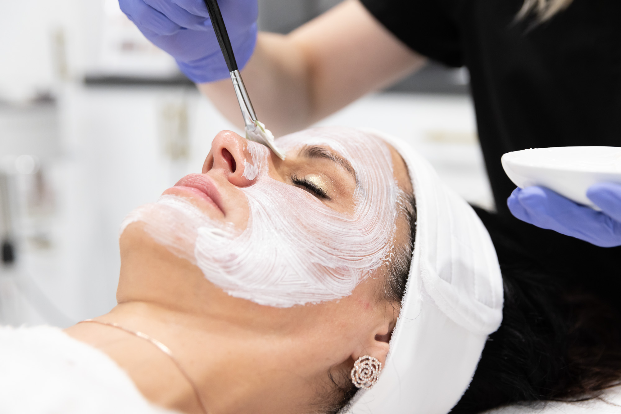 Woman recieving custom facial in Oklahoma City