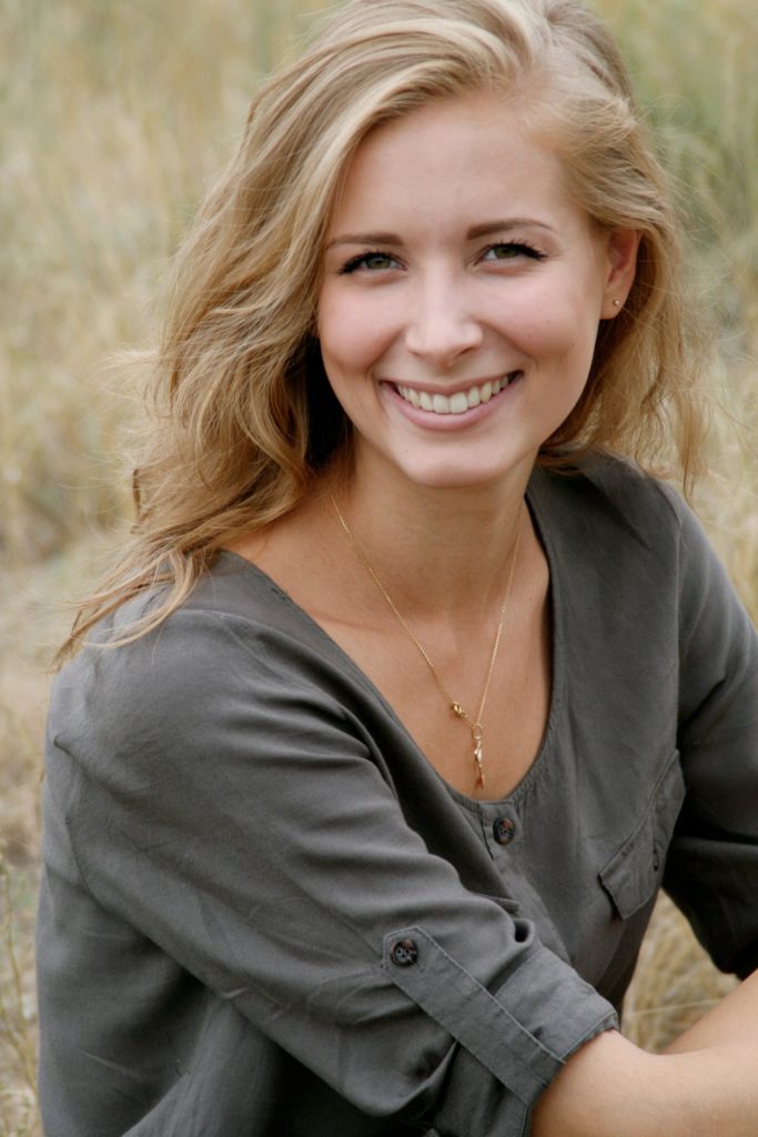 woman smiling after microdermabrasion treatment