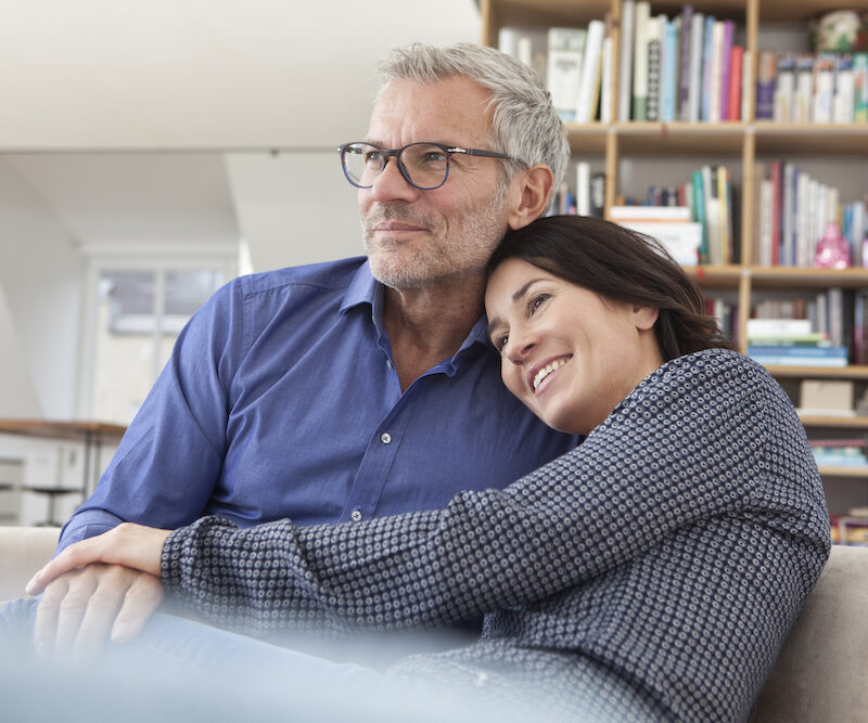mature couple happily cuddling after BHRT in OKC