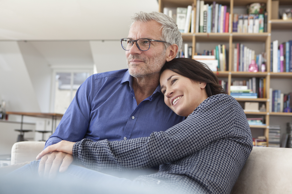 mature couple happily cuddling after a vaginal dryness treatment in Oklahoma City